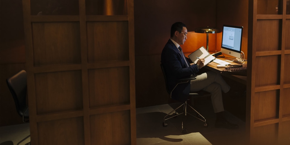 The Bureau room at The Pier - Man working on computer